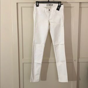 Cross cross detailed white super skinny jeans